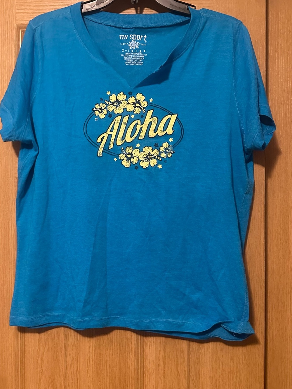 MV Sport Blue Aloha Short Sleeve Tee with Yellow Floral Print